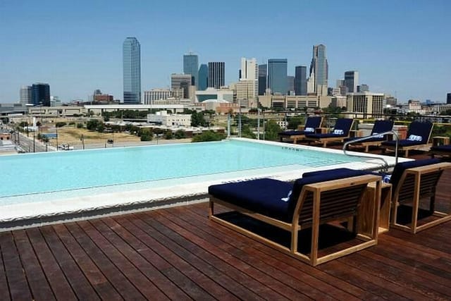 Rooftop pool at Canvas Dallas Hotel, ideal for upscale events and networking.