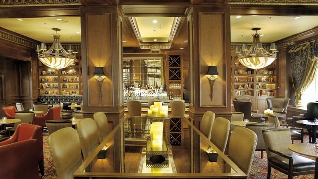 Elegant Library Lounge in Canvas Dallas Hotel for corporate events and meetings.
