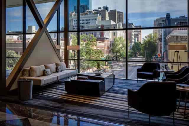 Modern lounge at Worthington Renaissance Fort Worth, ideal for networking events and conferences.