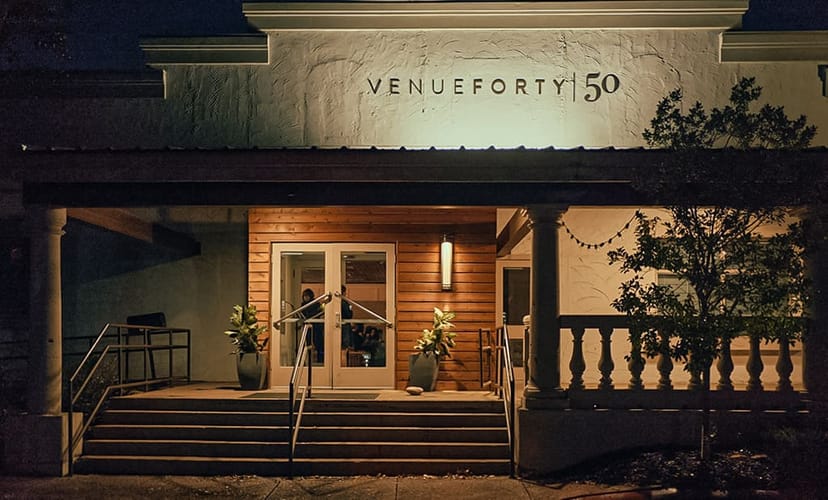Covered patio area at Venue Forty|50 with elegant architecture for events and meetings.