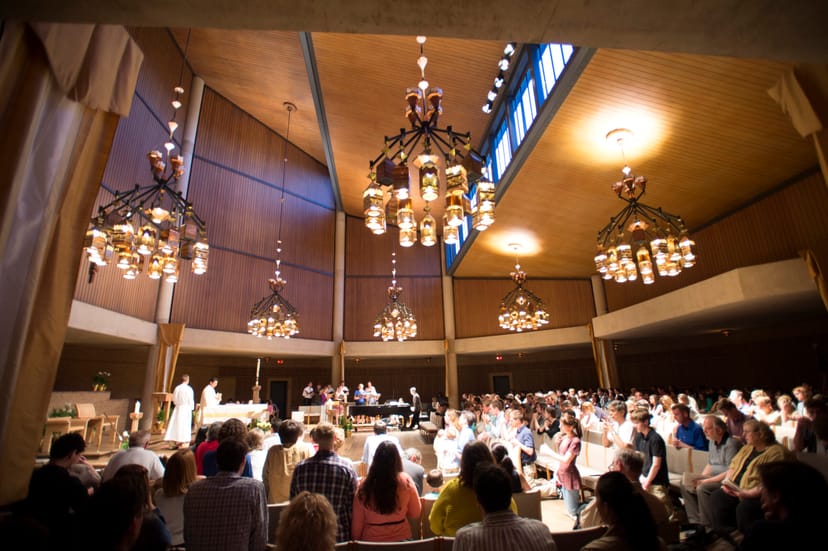 Catholic Foundation boardroom at University of Dallas, featuring elegant chandeliers for formal events.