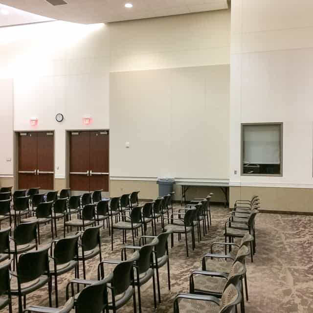 Empty meeting room setup at Collin College, ideal for presentations or discussions.