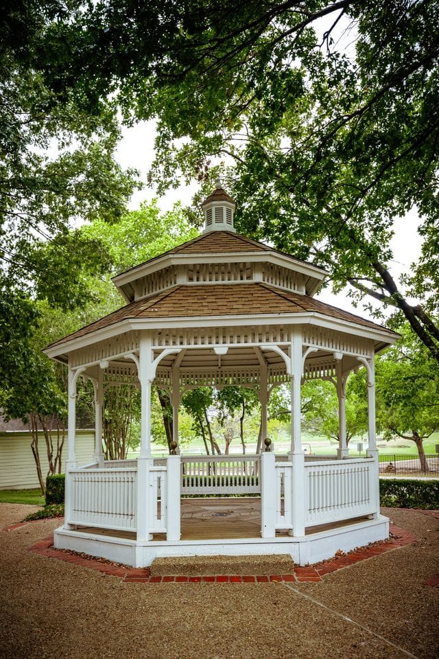 Charming gazebo in Richardson Woman's Club, perfect for outdoor ceremonies and receptions.