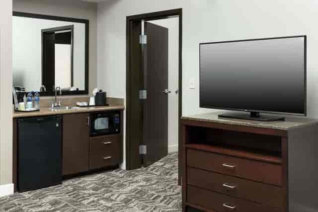 Hospitality suite at Hilton Garden Inn DFW with mini-fridge for meetings and events.