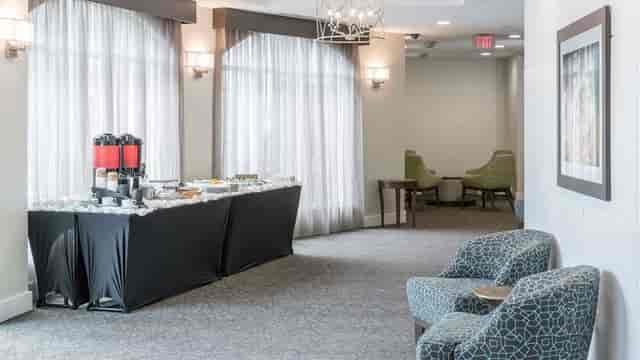 Meeting room at Hilton Garden Inn DFW, with refreshment station for networking events.