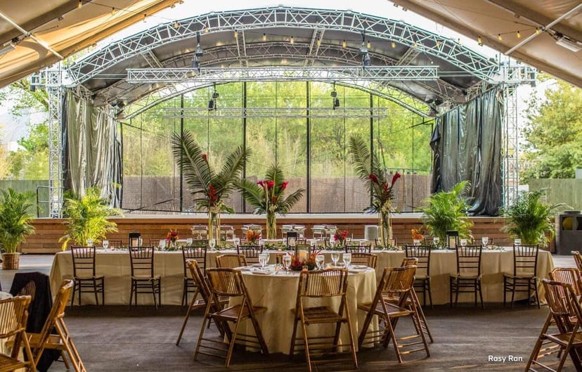 Event space with stage at Bluebonnet Café in Fort Worth Zoo, ideal for weddings and corporate events.