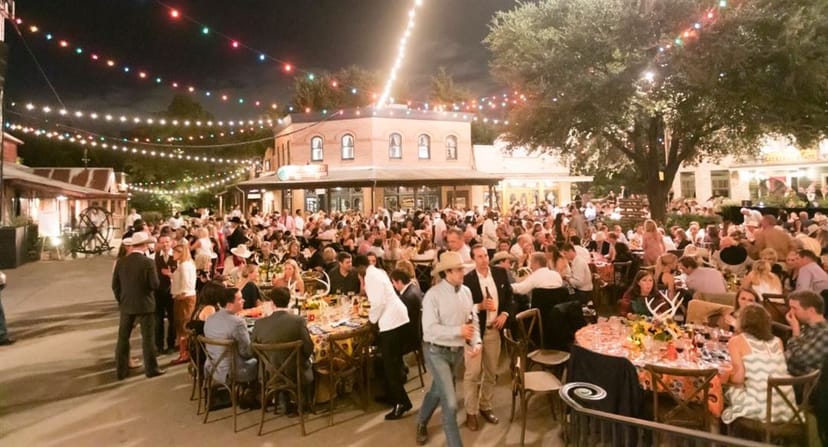 Crocodile Café at Fort Worth Zoo, vibrant outdoor corporate event with twinkling lights.
