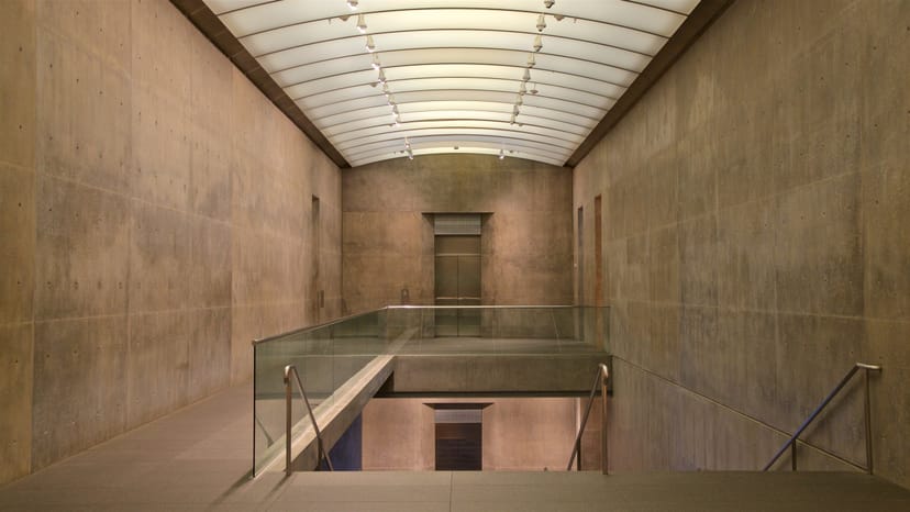 Modern event space with concrete walls at the Fort Worth Museum for art exhibitions and meetings.