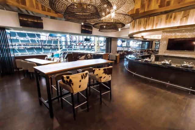 Lexus Club at Globe Life Field: modern event space with stylish bar seating for corporate gatherings.