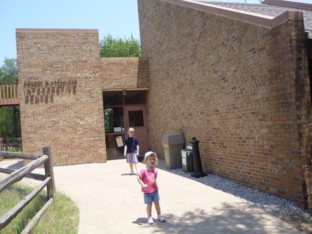 Hardwicke Interpretive Center entrance, rustic brick architecture, outdoor events space