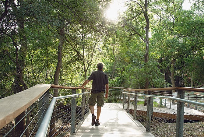 Wildlife sanctuary pathway at Fort Worth Nature Center for outdoor events and team-building.
