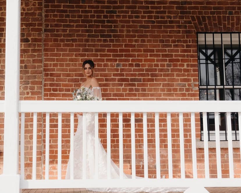 Bride at rustic wedding venue in Historic Dallas Jail, ideal for intimate celebrations.