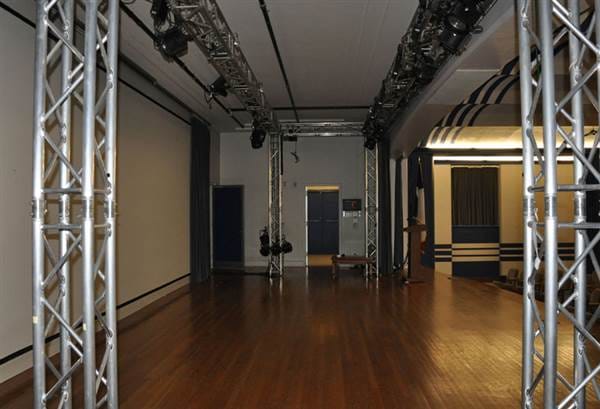 Versatile Margaret and Al Hill Lecture Hall with sleek truss structures for events.