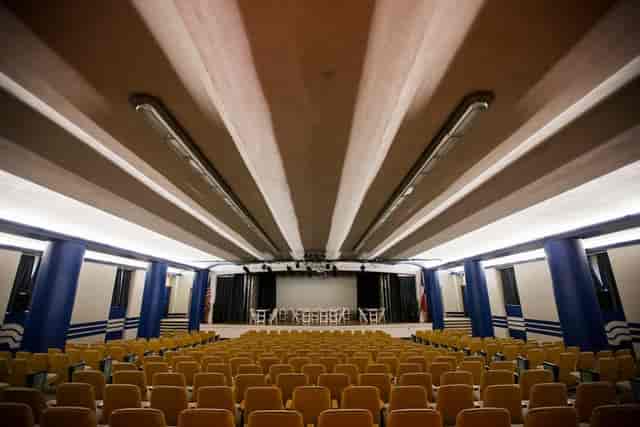 Margaret and Al Hill Lecture Hall with tiered seating for conferences and presentations.