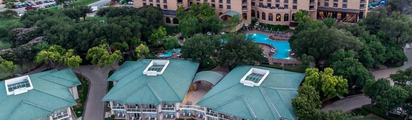 Ritz-Carlton Dallas conference center with lush landscaping, ideal for events and retreats.