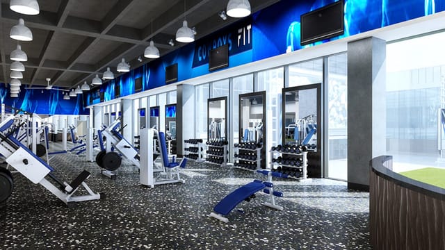 Modern fitness center in Dallas Athletic Club with natural light, ideal for wellness events.