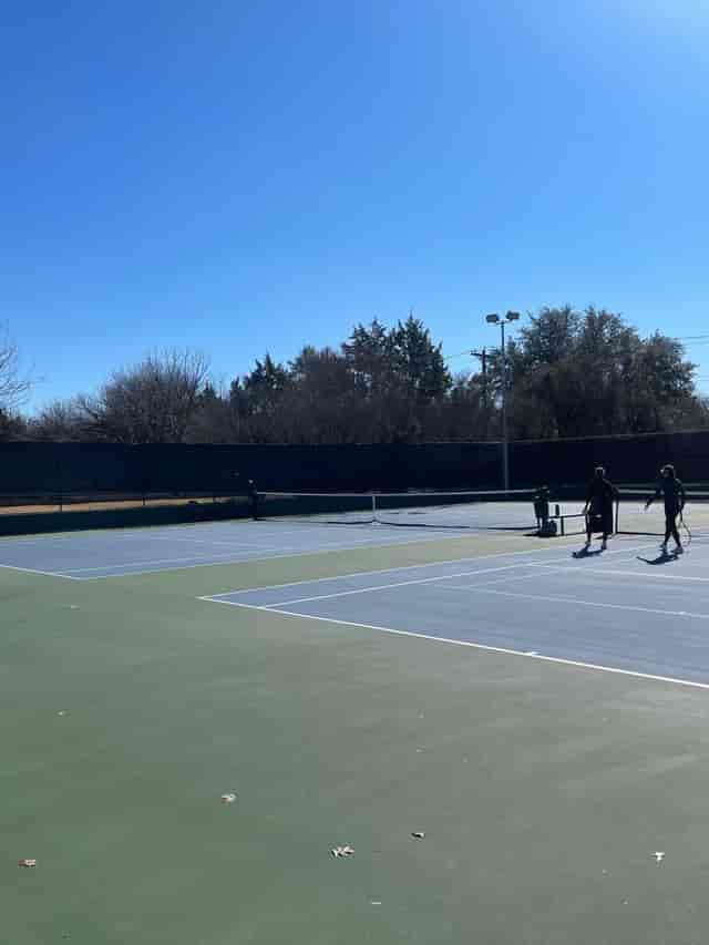 Outdoor tennis court at Dallas Athletic Club for corporate sports events and team building.