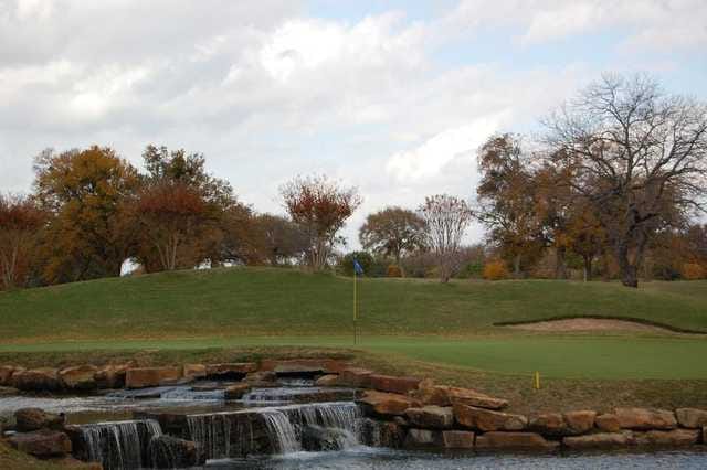 Golf course at Dallas Athletic Club, lush greens ideal for outdoor meetings and retreats.