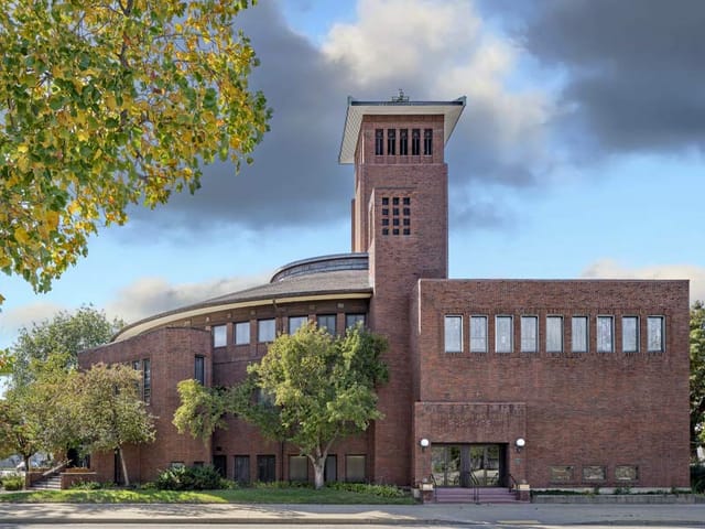 Wesley Center at St. Paul's UMC: modern venue with distinctive tower, ideal for events.