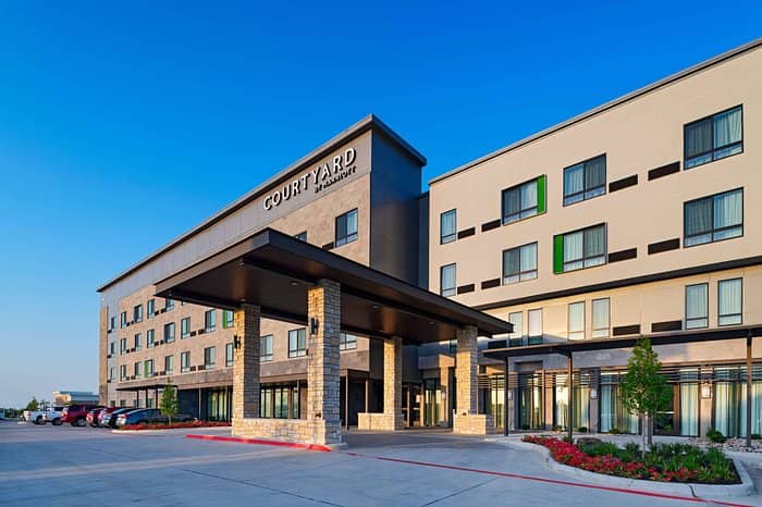 Modern Courtyard by Marriott, ideal for corporate meetings and events in Lone Star Park.