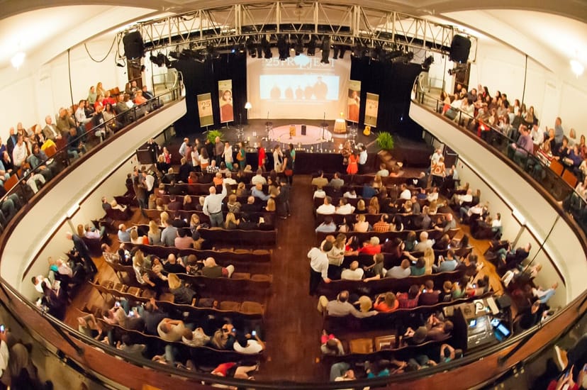 Packed McKinney Performing Arts Center auditorium, ideal for performances and presentations.