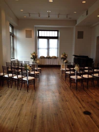 Ruschhaupt Hall: Elegant event space with floral arrangements for gatherings and ceremonies.