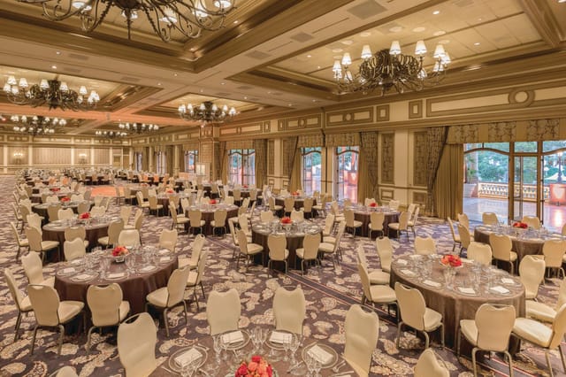 Elegant Bellagio ballroom banquet hall for weddings and galas with sophisticated table settings.