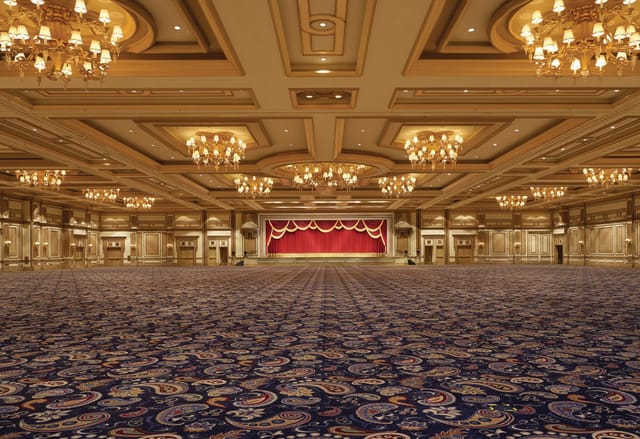 Elegant Bellagio ballroom with chandeliers, ideal for conferences and galas.