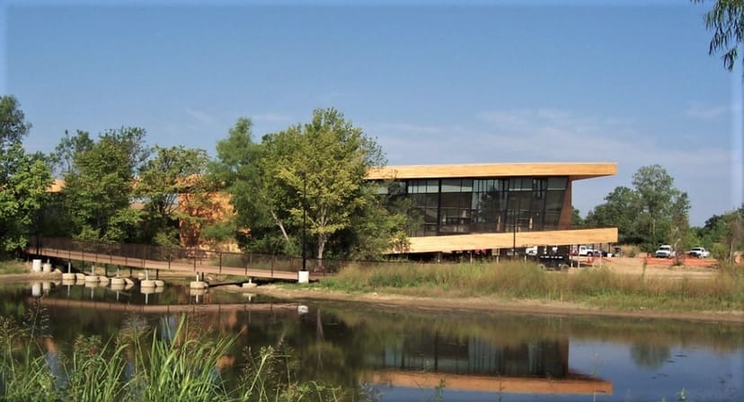 Modern visitor center with large windows, perfect for events near Trinity River.