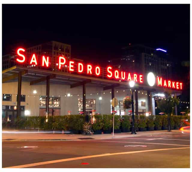 "San Pedro Square Market at night, vibrant venue for events and gatherings."