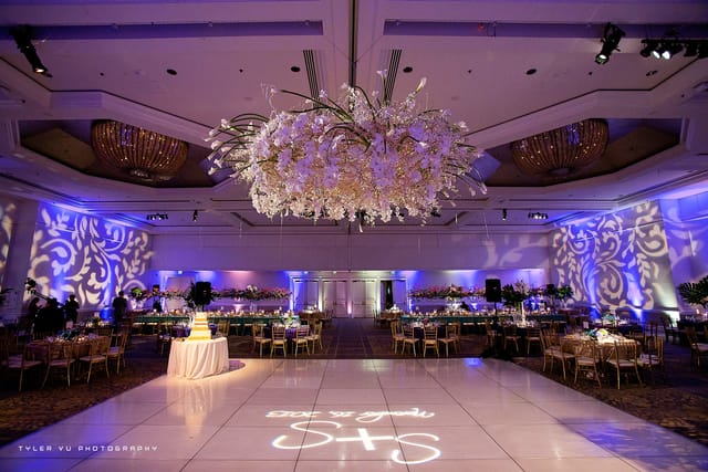 Elegant ballroom at The Fairmont San Jose, ideal for weddings and galas with floral chandelier.
