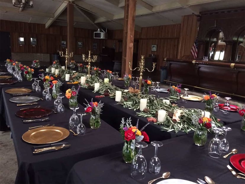 Elegant banquet table at Heritage Hall with floral centerpieces for formal events.