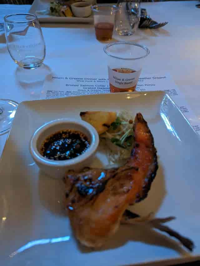 Broiled salmon dish at Wine Vault & Bistro for upscale corporate events and catering.