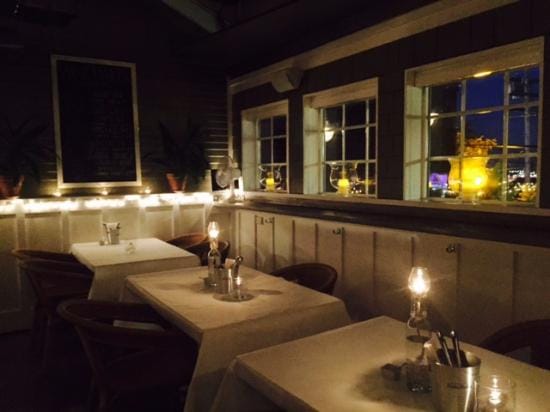Charming bistro dining space with elegant tables for intimate gatherings and events.