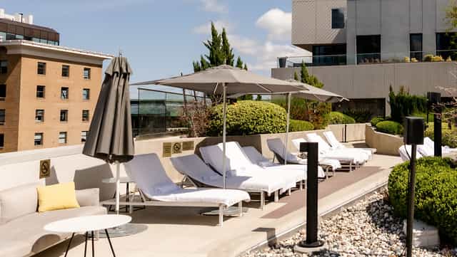Rooftop pool deck at Kimpton Sawyer Hotel for stylish outdoor networking events.