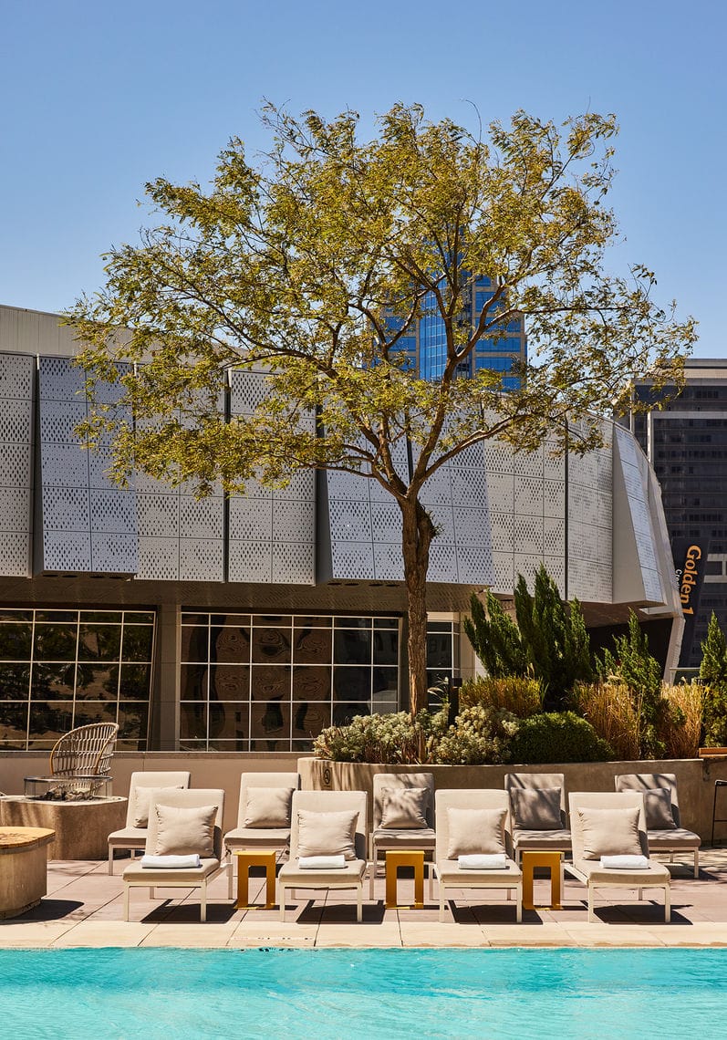 Revival Lounge in Kimpton Sawyer Hotel, modern venue with large windows for events.