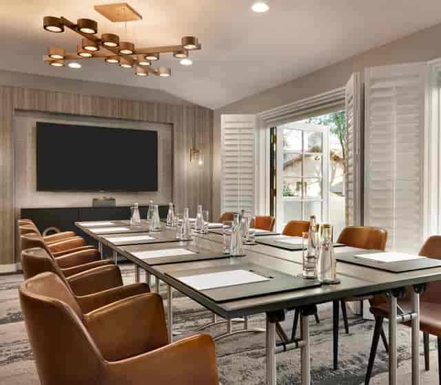 Modern meeting room at Fairmont Hotels, ideal for professional gatherings and collaborative events.