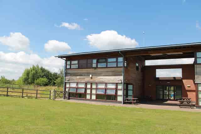 The Rectory outdoor venue with large windows, ideal for corporate retreats and events.