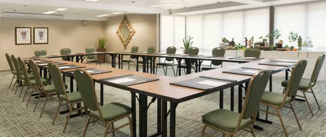 Conference room at DoubleTree San Jose with U-shaped tables for professional gatherings.