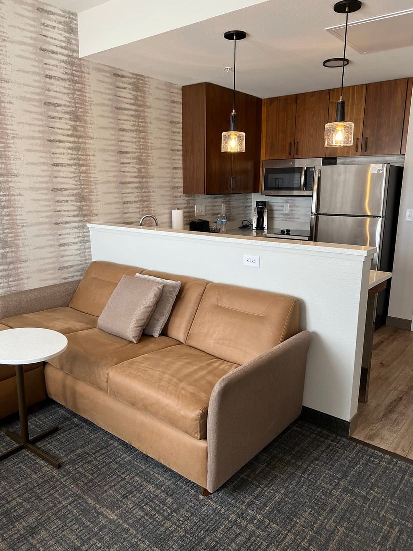 Modern living space in Residence Inn San Jose, ideal for informal meetings and brainstorming.