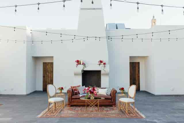 Outdoor event space at Blanco Urban Venue with elegant decor and string lights.