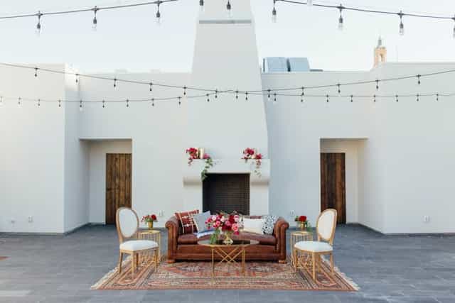 Outdoor event space at Blanco Urban Venue with elegant decor and string lights.