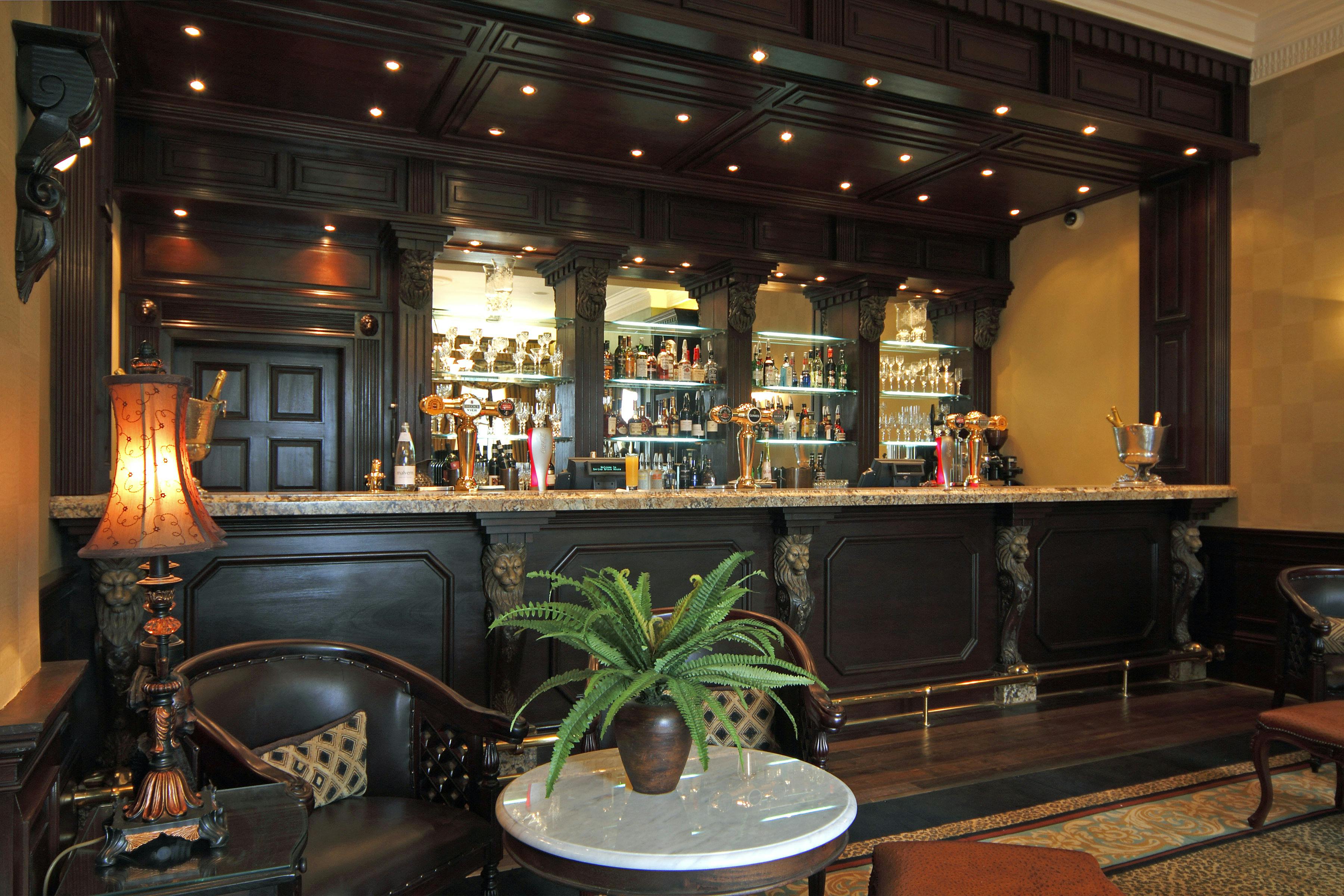 Spring Grove House bar with elegant woodwork, ideal for networking events and meetings.
