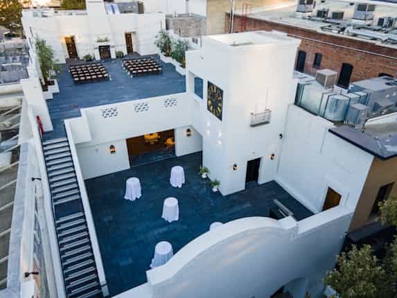 Stylish rooftop terrace venue with modern design for corporate and social events.