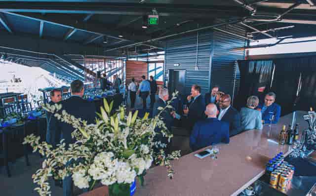 Sky Lounge event space with sleek bar, ideal for networking and gatherings.