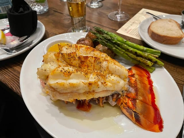 Elegant lobster tail dish at Scott's Seafood, perfect for gala dinner events.