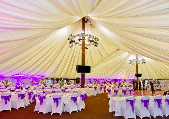 Tree Tops Pavilion event space with elegant tables, perfect for weddings and gatherings.