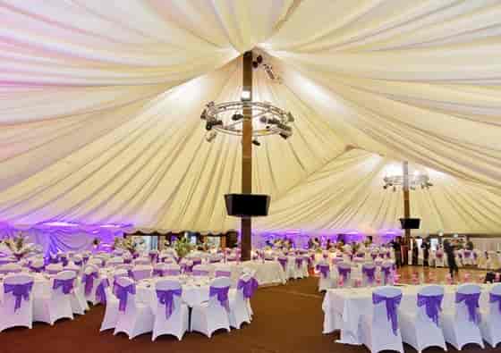 Tree Tops Pavilion event space with elegant tables, perfect for weddings and gatherings.