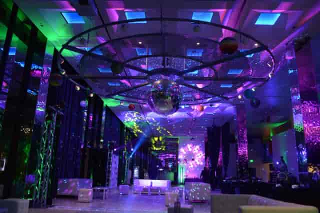 Vibrant Utopia Club function room with disco ball, perfect for parties and corporate events.