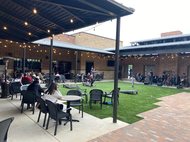 Sunnyvale Community Center outdoor event space with string lights for casual gatherings.
